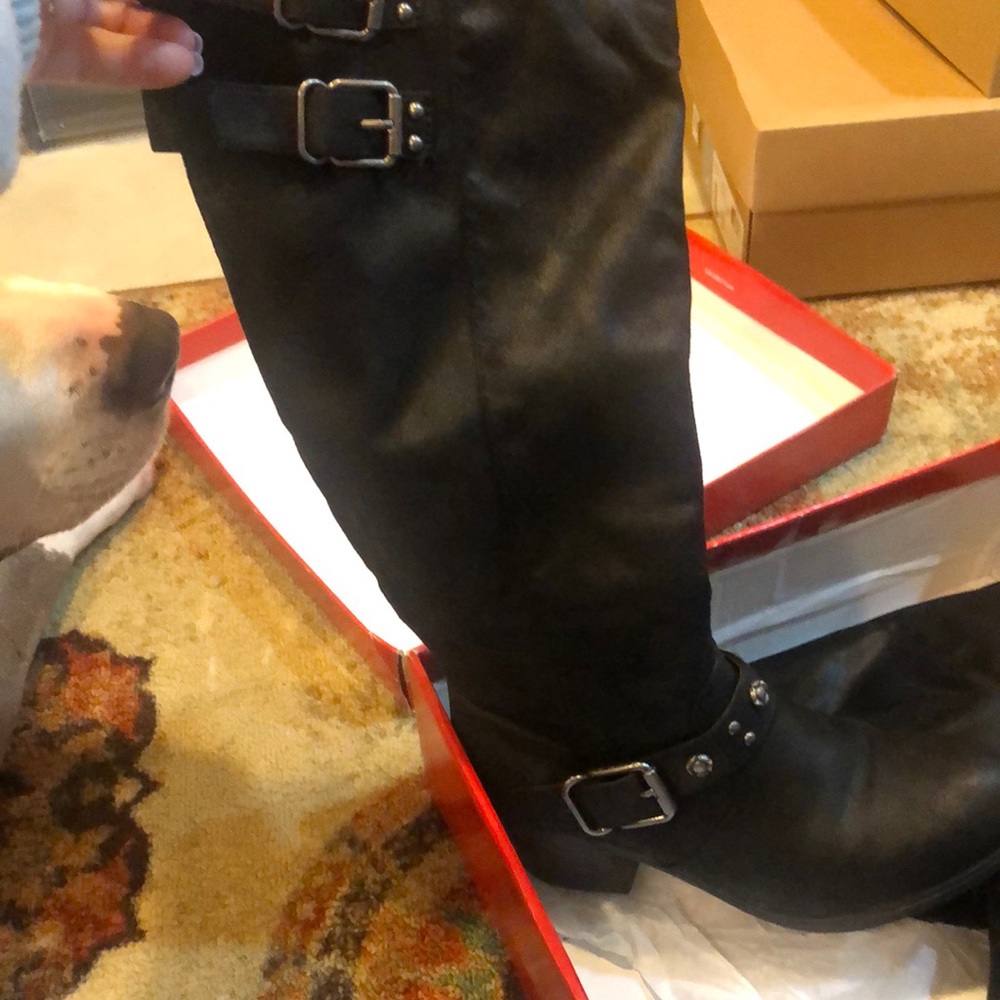 Carlos Santana riding boots